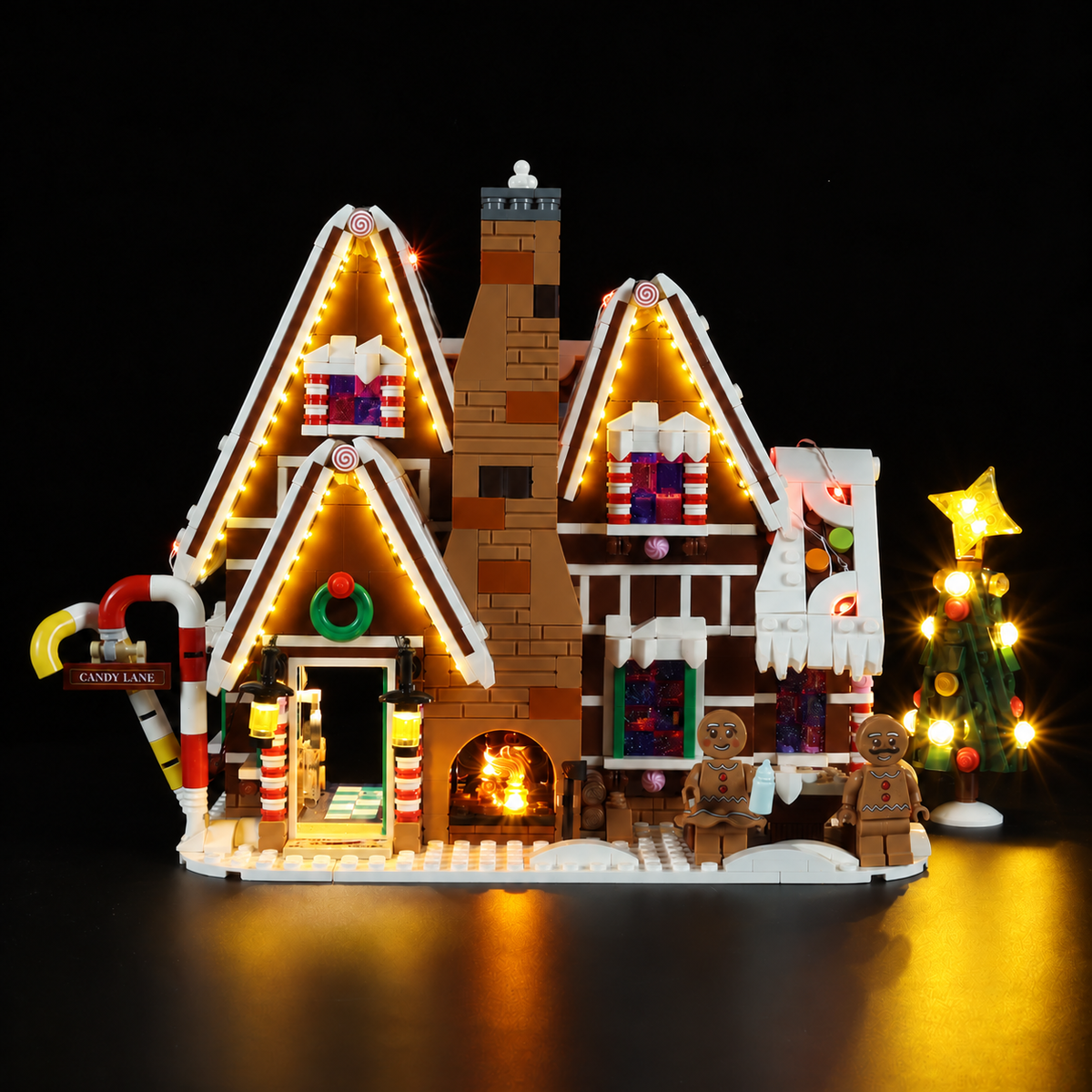 Enhanced lighting visualization of LEGO Gingerbread House10267 in the same Classic source frame; verified additional front-gable strip lights added.