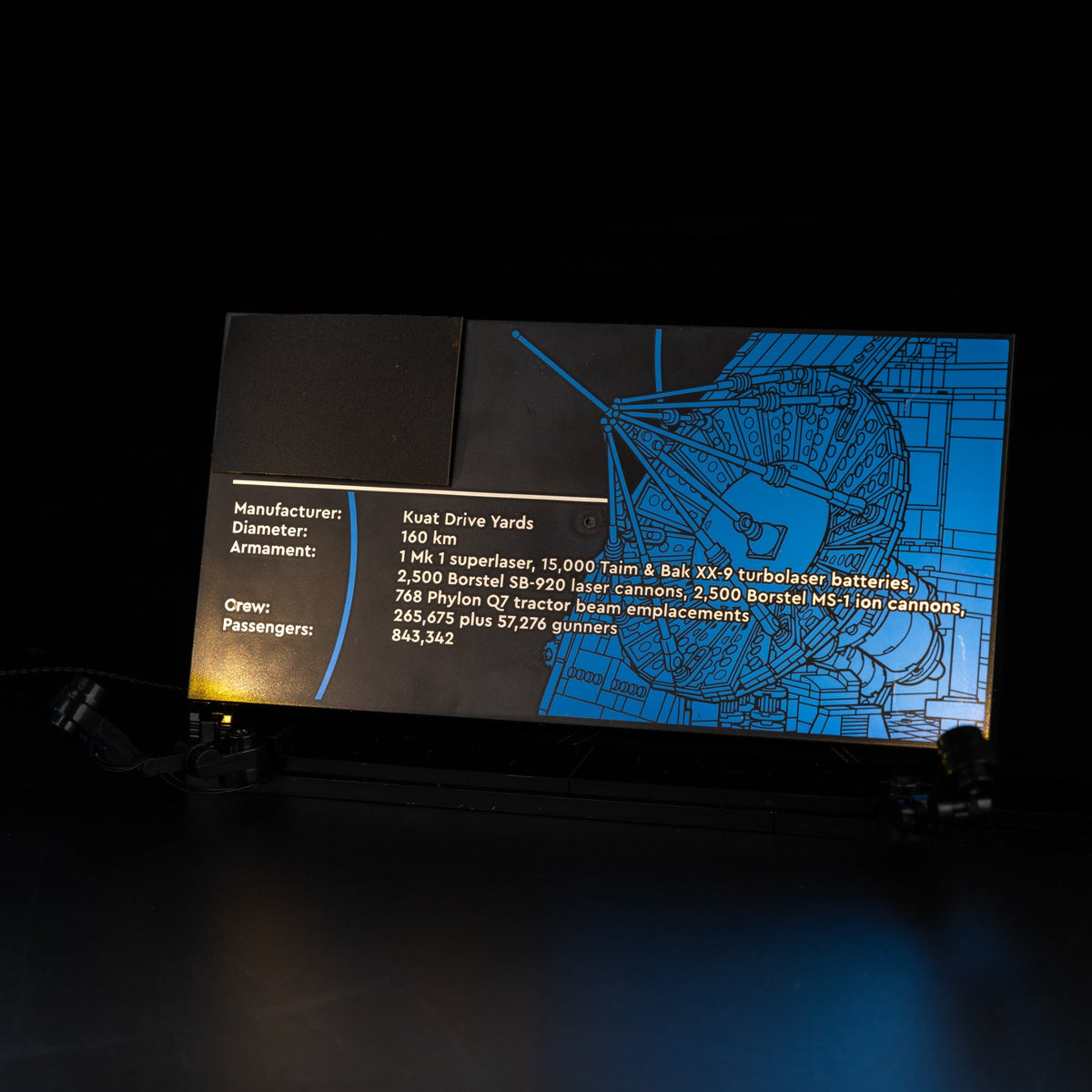 Death Star display plaque illuminated at the base of the model