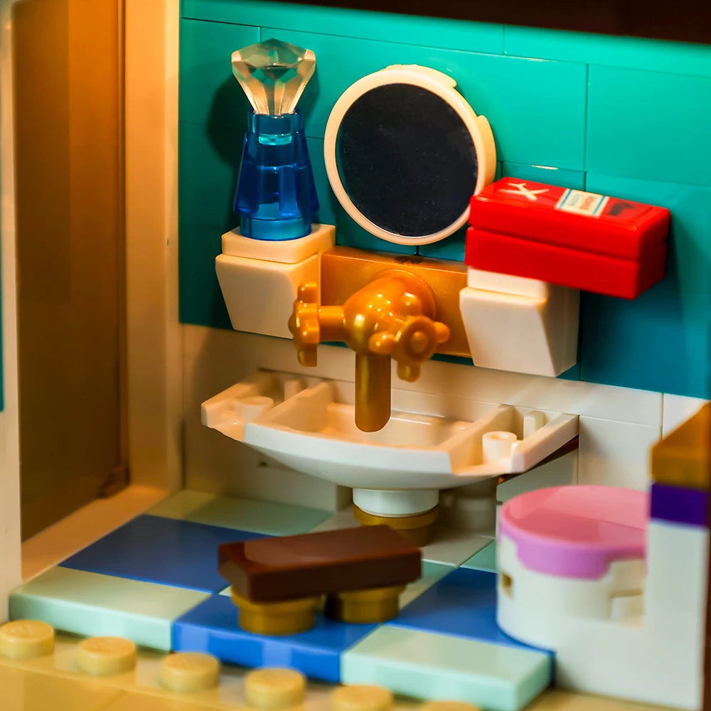 Illuminated bathroom sink and mirror with cool turquoise lighting