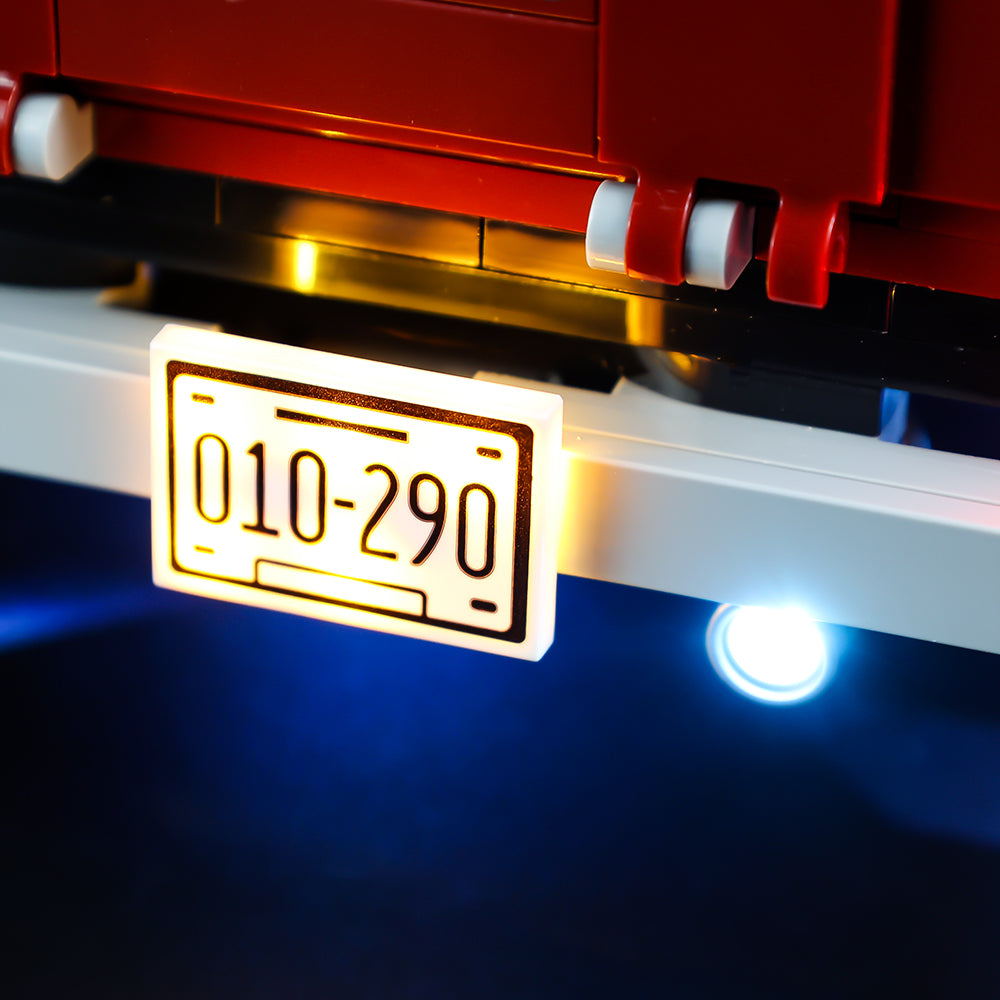 Illuminated rear number plate and blue lamp beneath LEGO® Pickup Truck 10290.