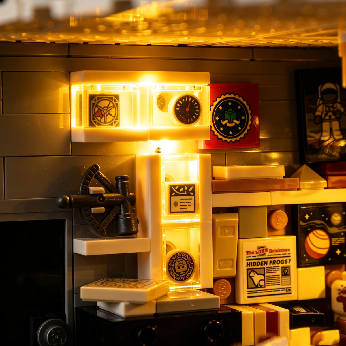 Warm LED lighting across the shelves and objects in Mulder’s LEGO office.
