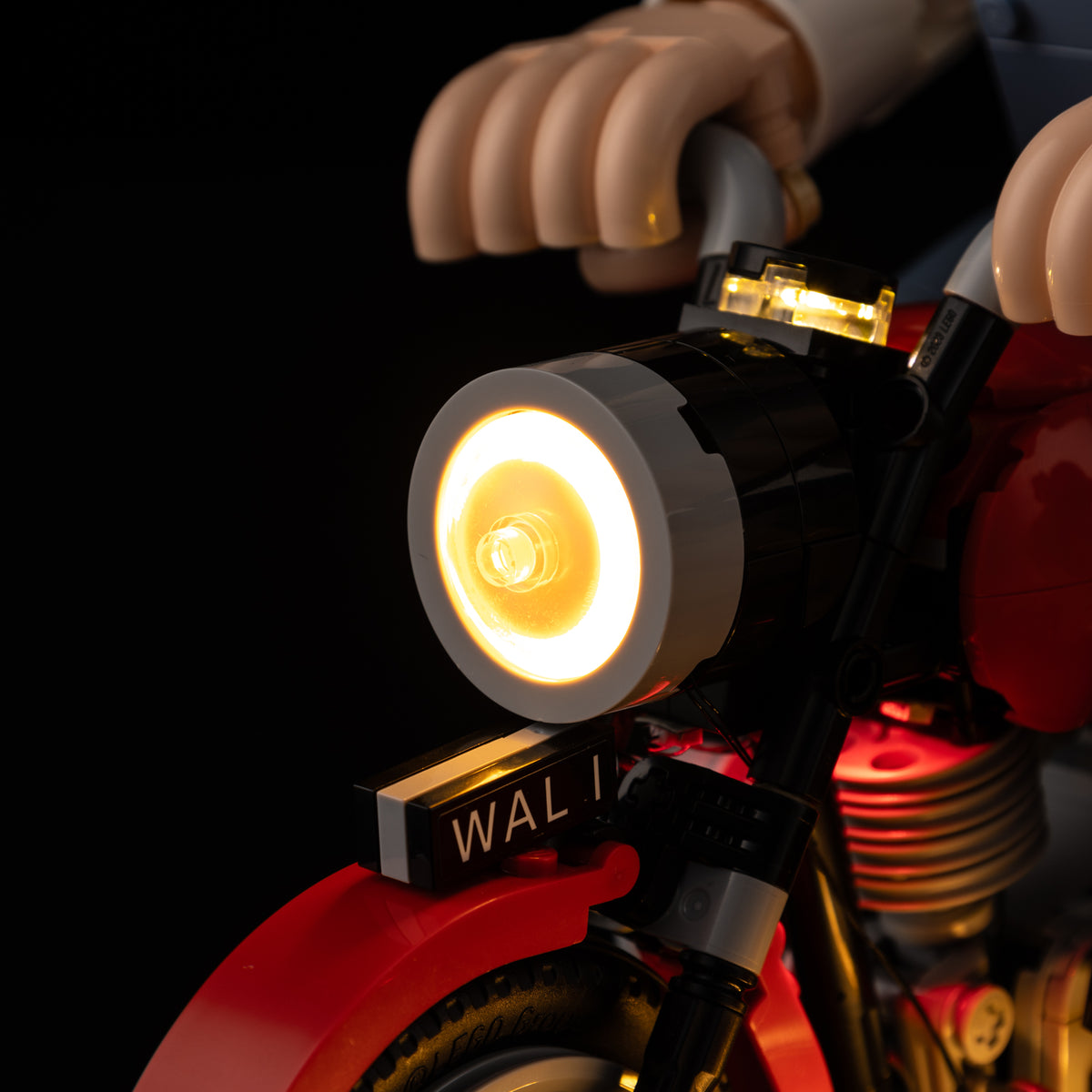 Actual warm-white Game of Bricks light in the LEGO® Wallace & Gromit motorcycle headlight.