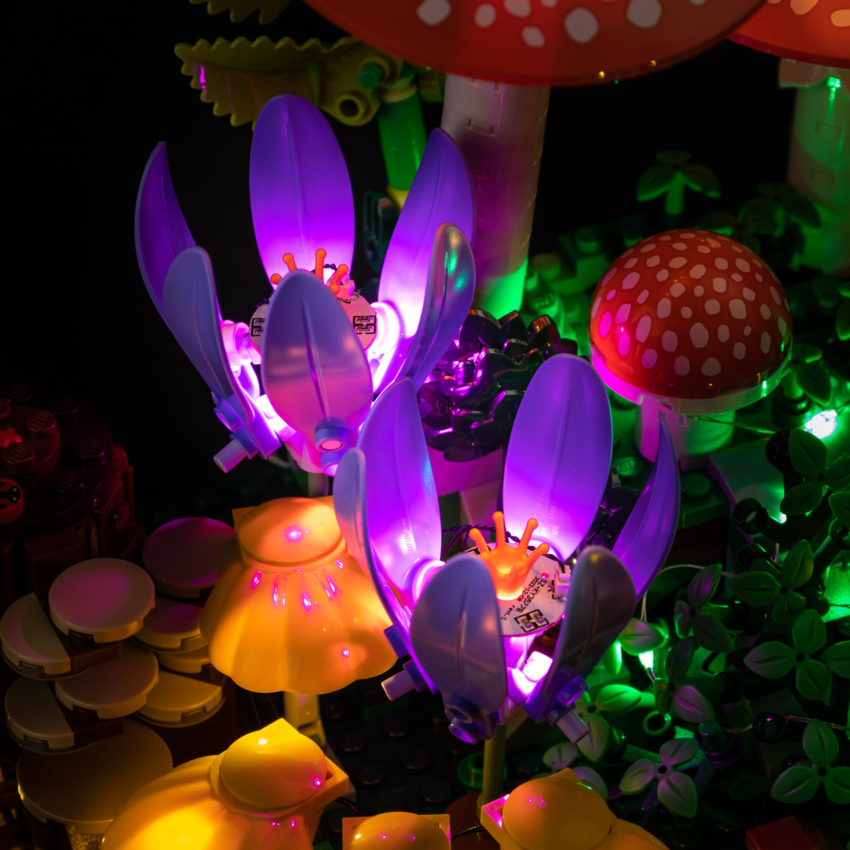 Purple Game of Bricks light in the two autumn crocuses among the LEGO mushroom details.