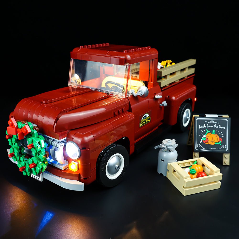 Original Classic lighting photograph of LEGO Pickup Truck10290, front view. Shared lighting and model geometry preserved.