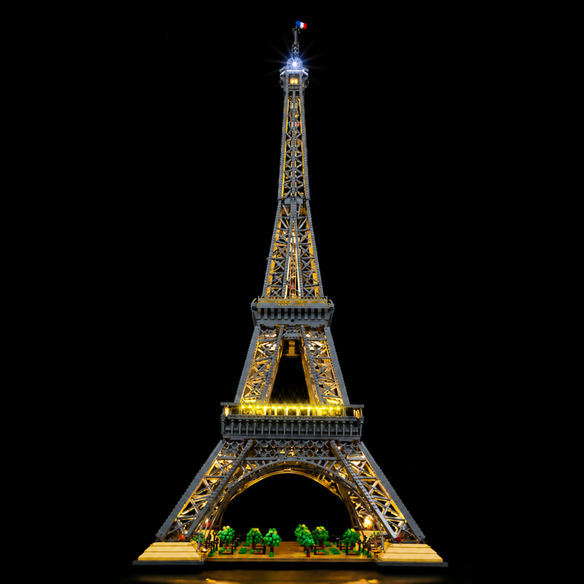 Actual warm-lit LEGO® Eiffel Tower 10307 with the Classic lighting layout, also supplied with Classic Remote.