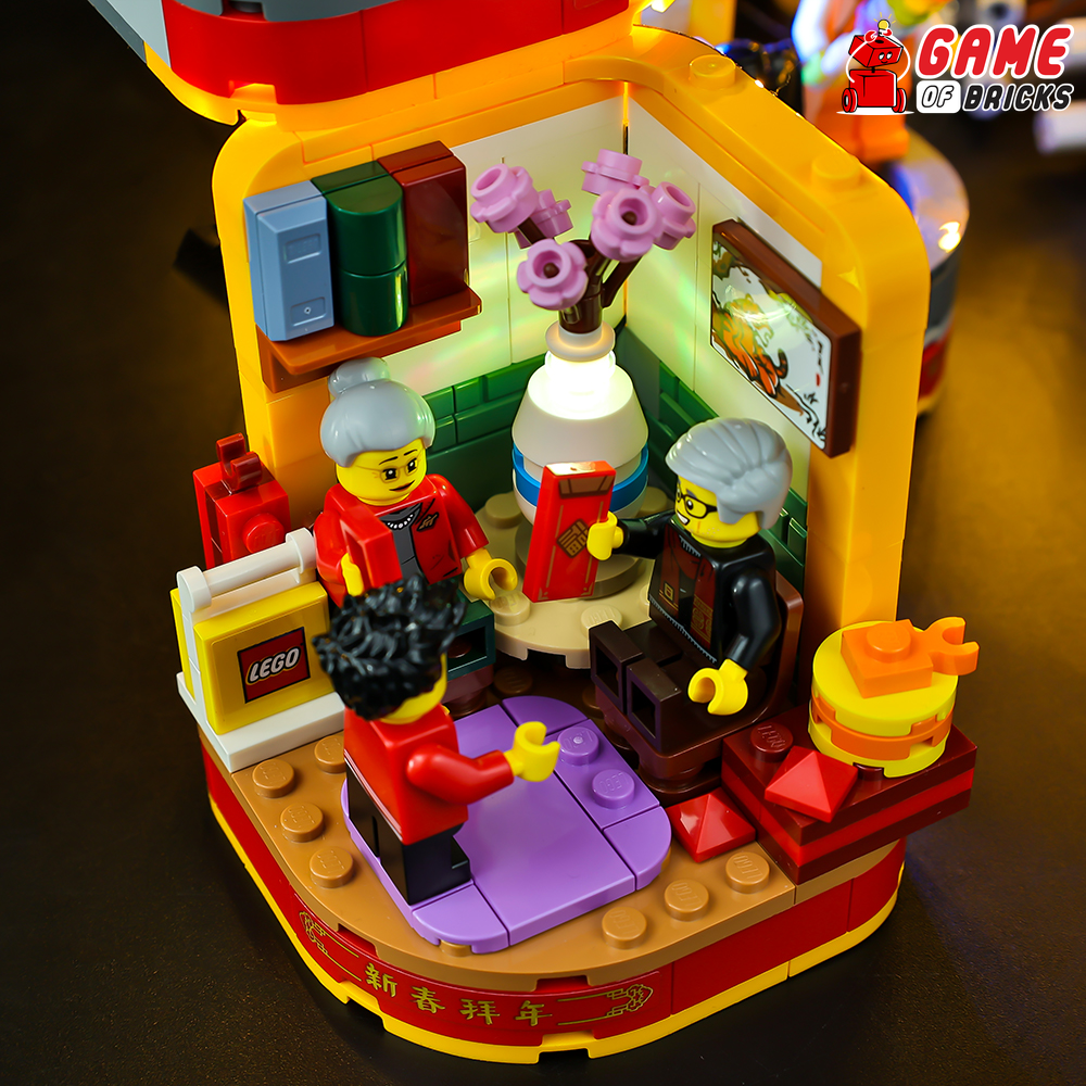 LEGO® Lunar New Year Traditions 80108, a visit with family with Game of Bricks lights