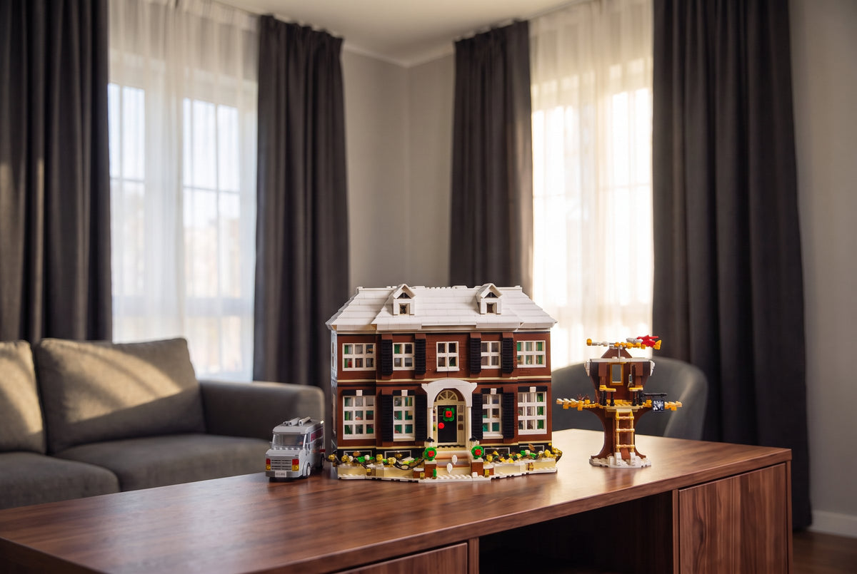 LEGO® Home Alone 21330 with van and tree house on a sideboard in daylight, light kit off