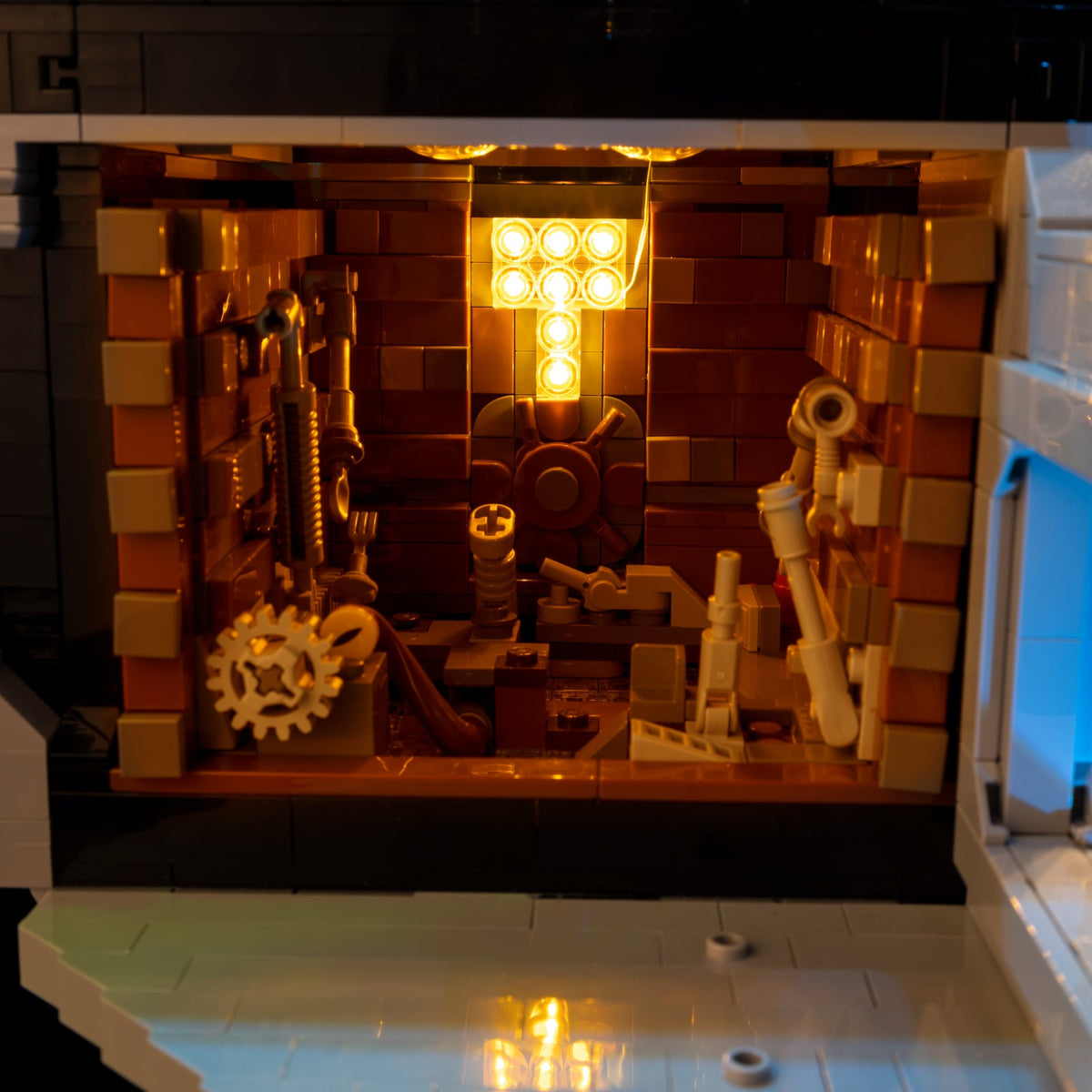 The orange-lit trash compactor with pipes and debris on the Death Star’s lower level