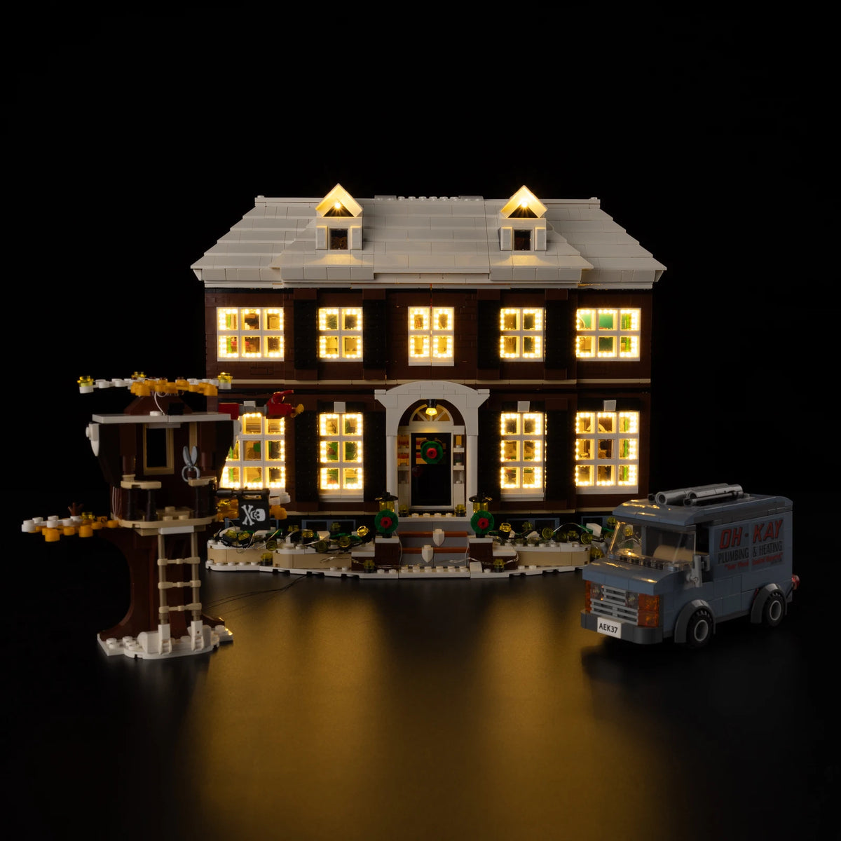 Line 1: warm window lights across the front of the Home Alone house