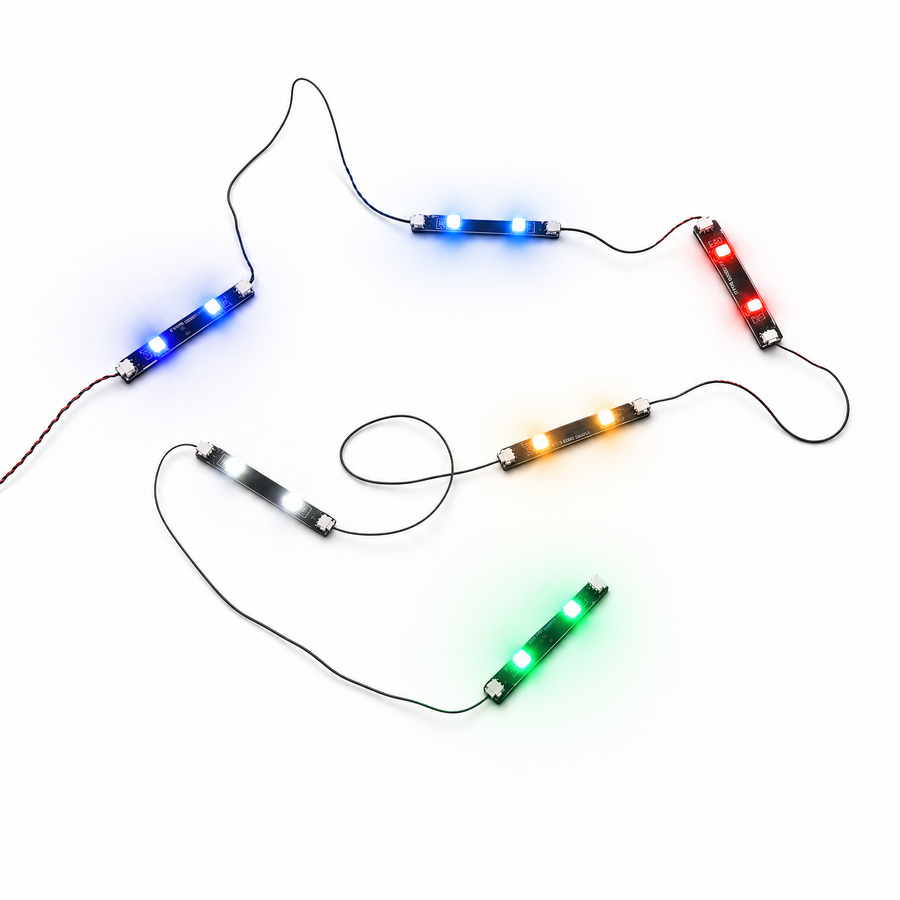 LED strip lights lit in colors on white background