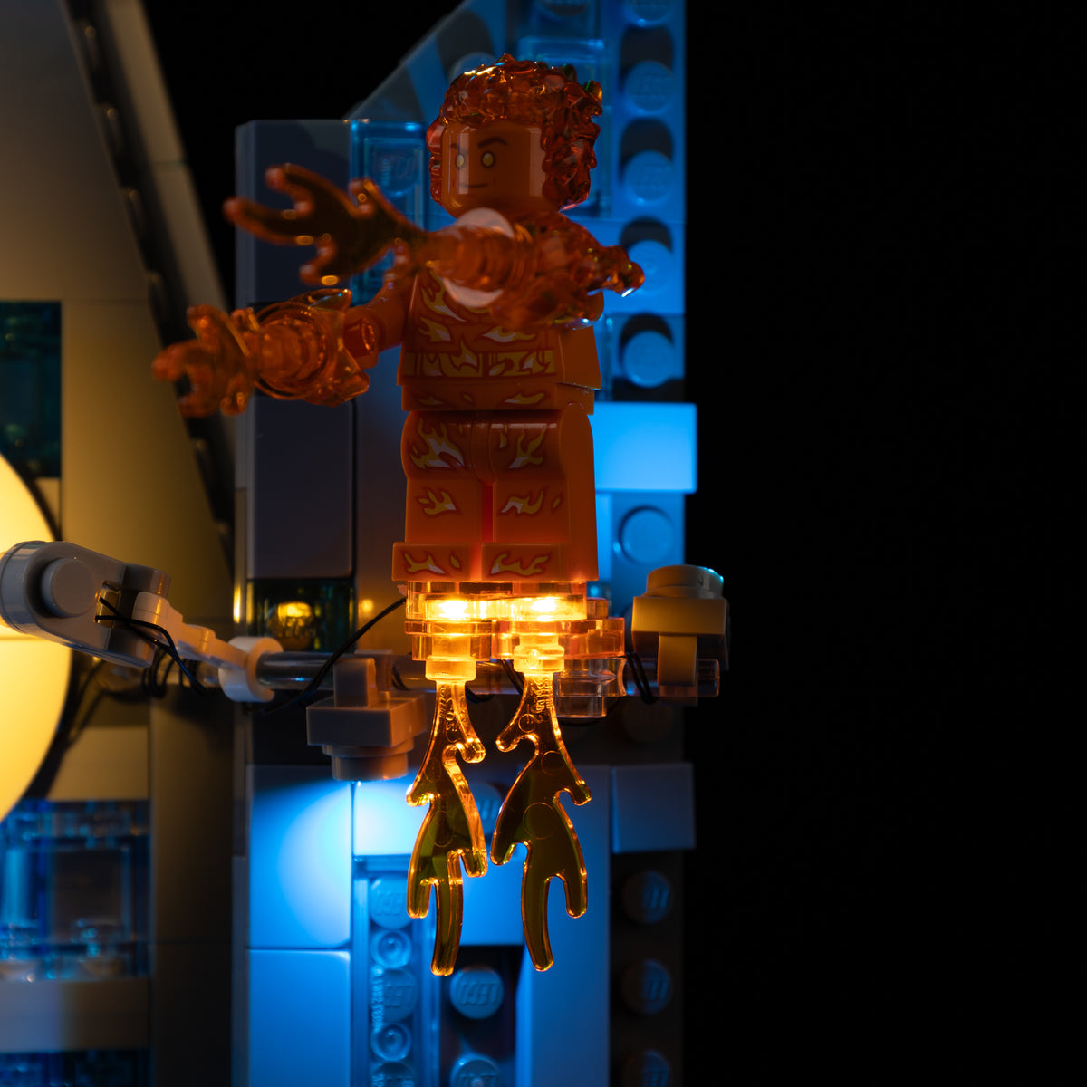 Orange Human Torch flame lighting from the Light Kit for LEGO® Avengers: Doomsday New Avengers Tower 76352