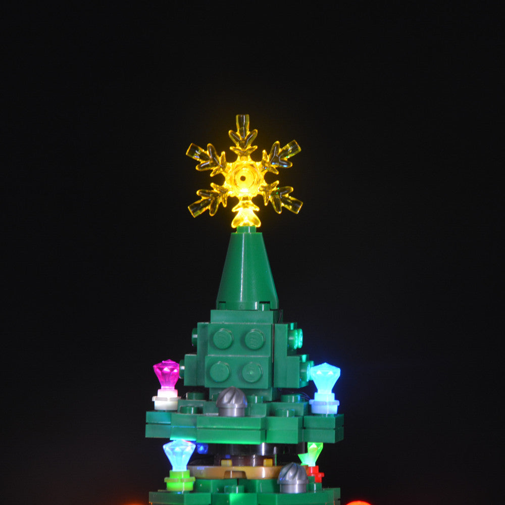 Light Kit for LEGO® Christmas Tree 40338 - close-up of the glowing snowflake topper