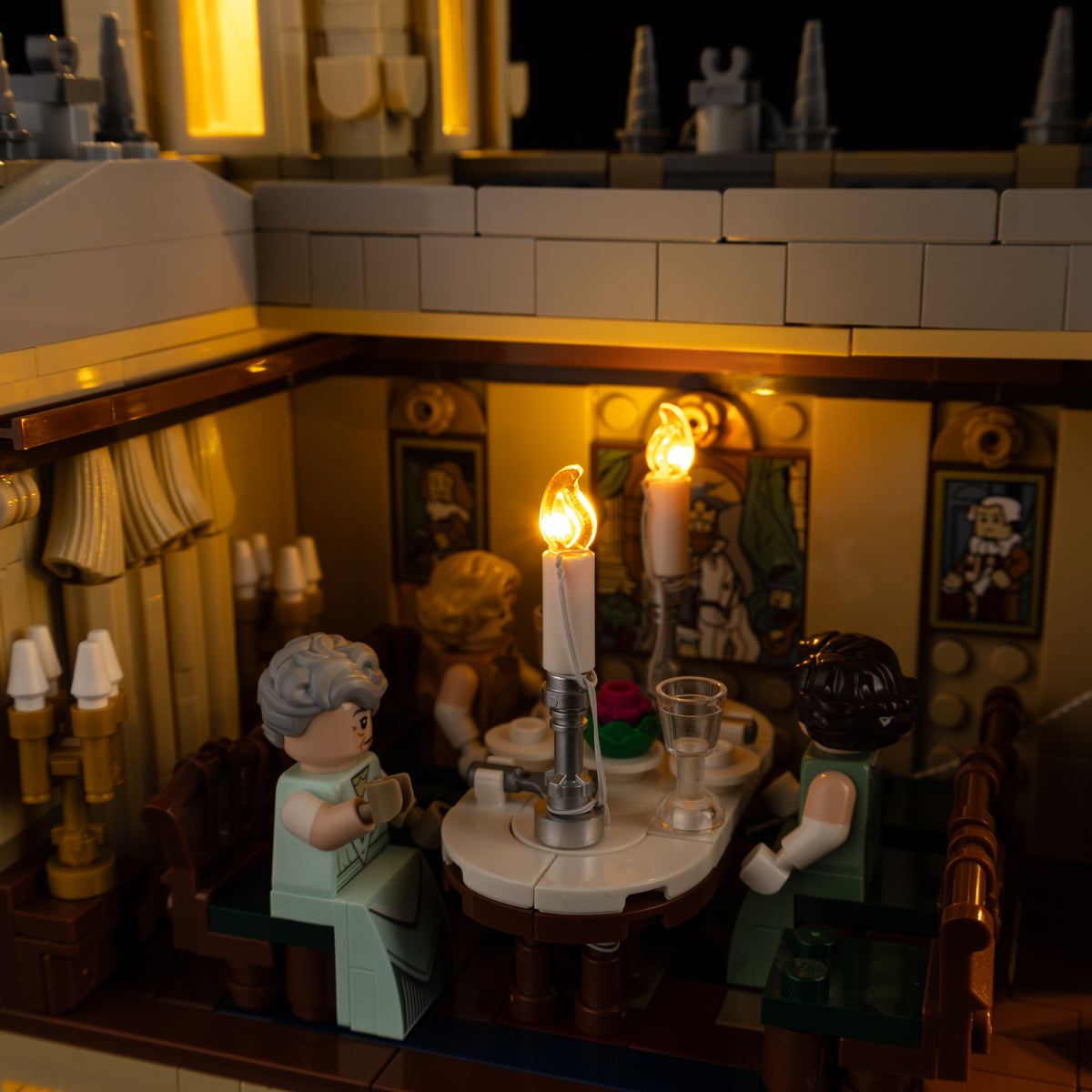 Warm candle lights above the dining room table in Downton Abbey 21373