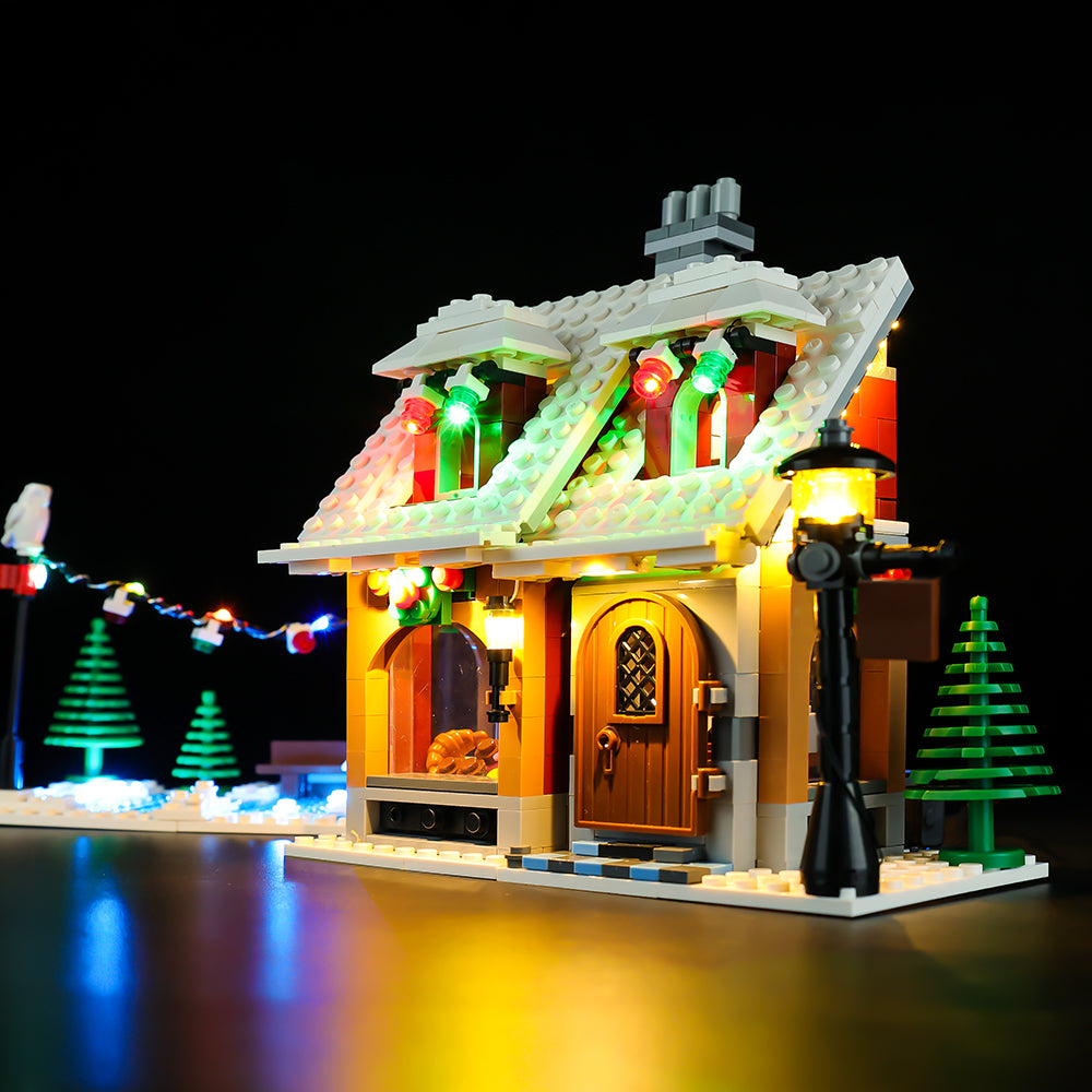 Light Kit for LEGO® Winter Village Bakery 10216 - front-quarter view of the illuminated bakery