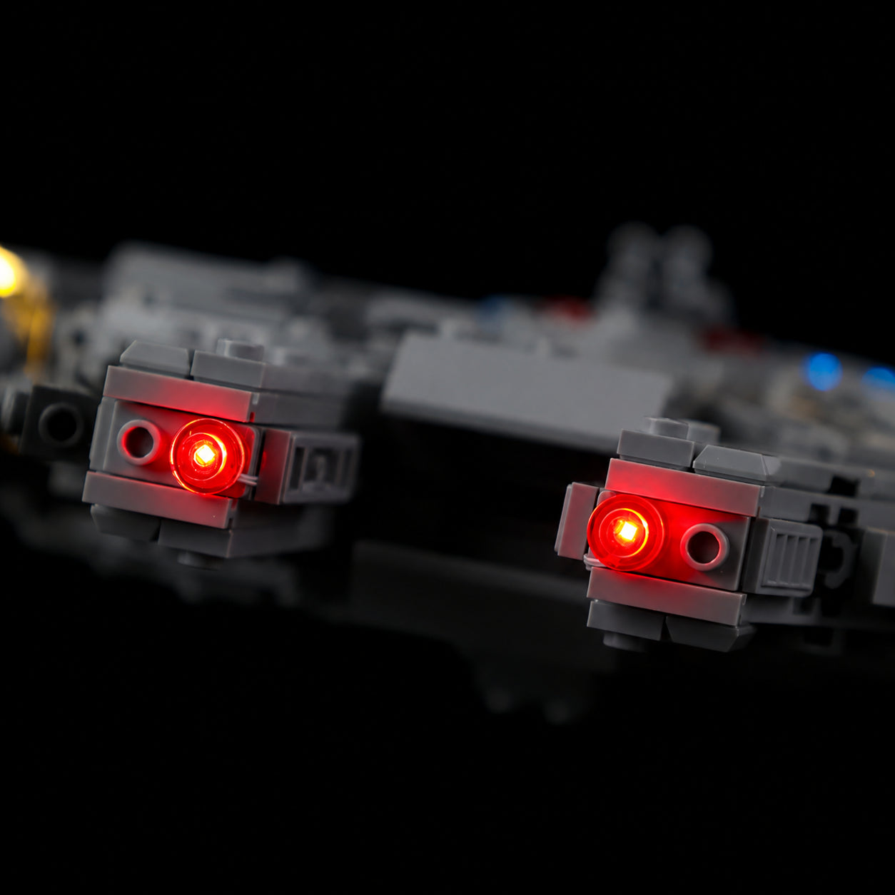 Two red lights at the Millennium Falcon forward mandibles